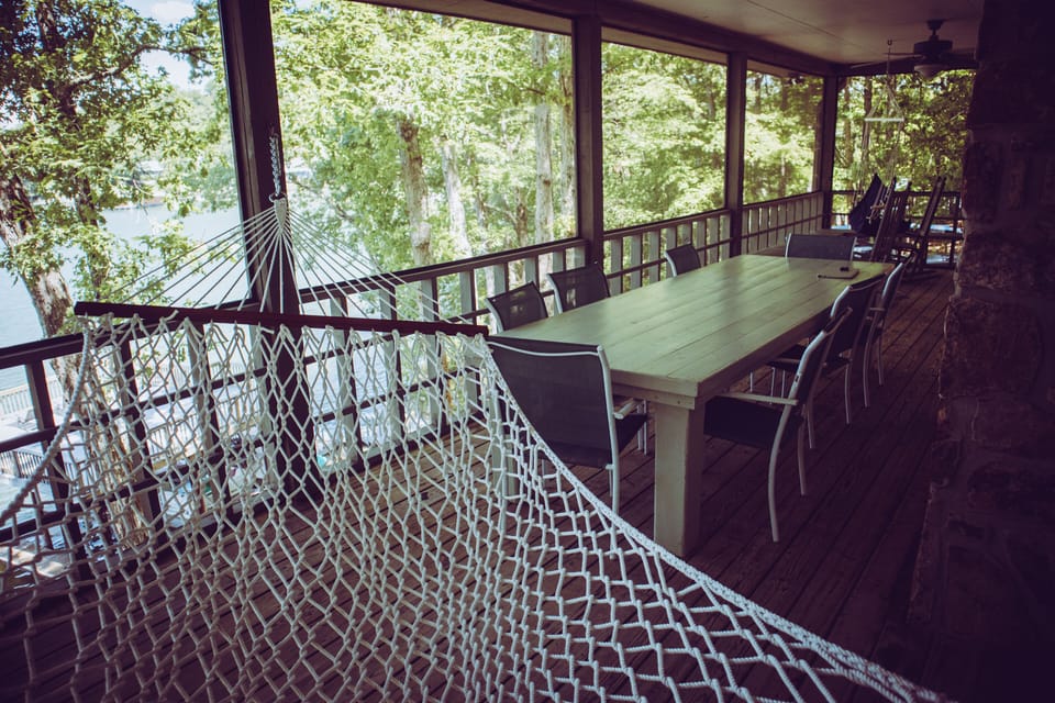 Huge screened in porch with table that seats 8-10. 
