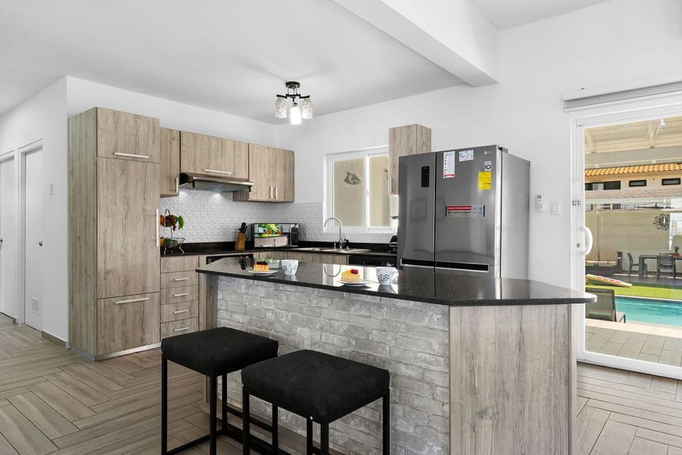 Discover the joy of cooking in our meticulously organized and fully equipped kitchen.
