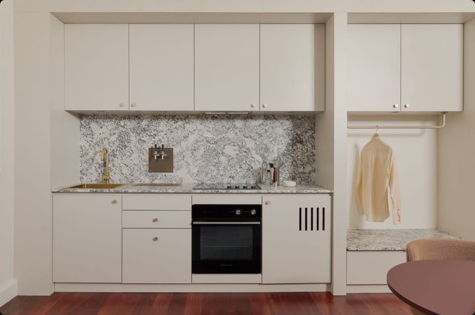 Laura Suite w/ Kitchenette & Lounge | Living area | 55-inch Smart TV with digital channels, TV, Netflix