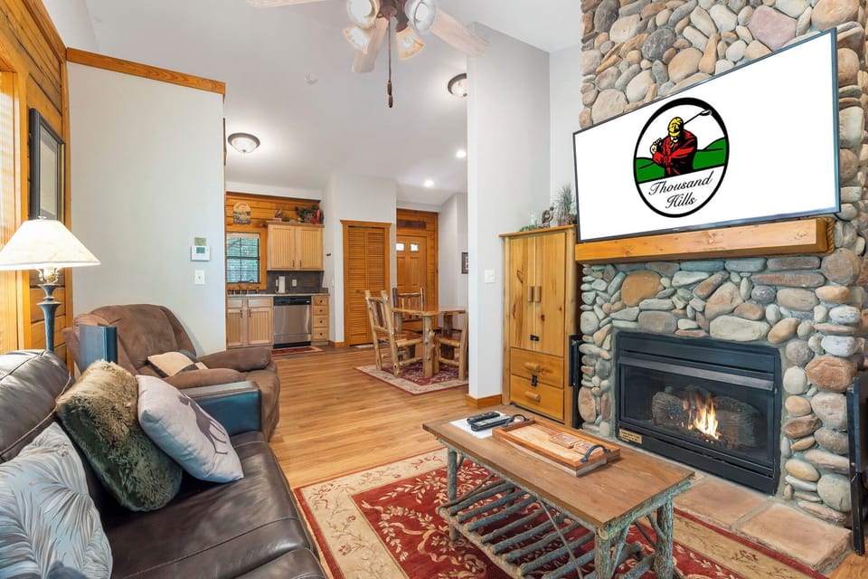 Living Room with Seasonal Gas Fireplace, Large screen TV, and Queen Size Sofa Bed