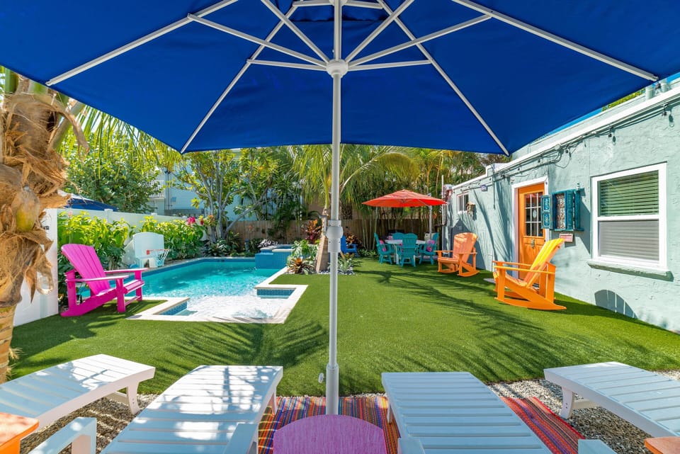 Turf around the pool area for the Front Cottage