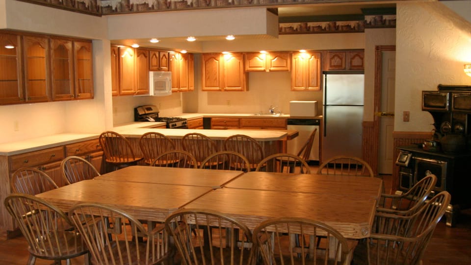 Family Suite | Private kitchen | Coffee/tea maker, full-size fridge, cookware/dishes/utensils