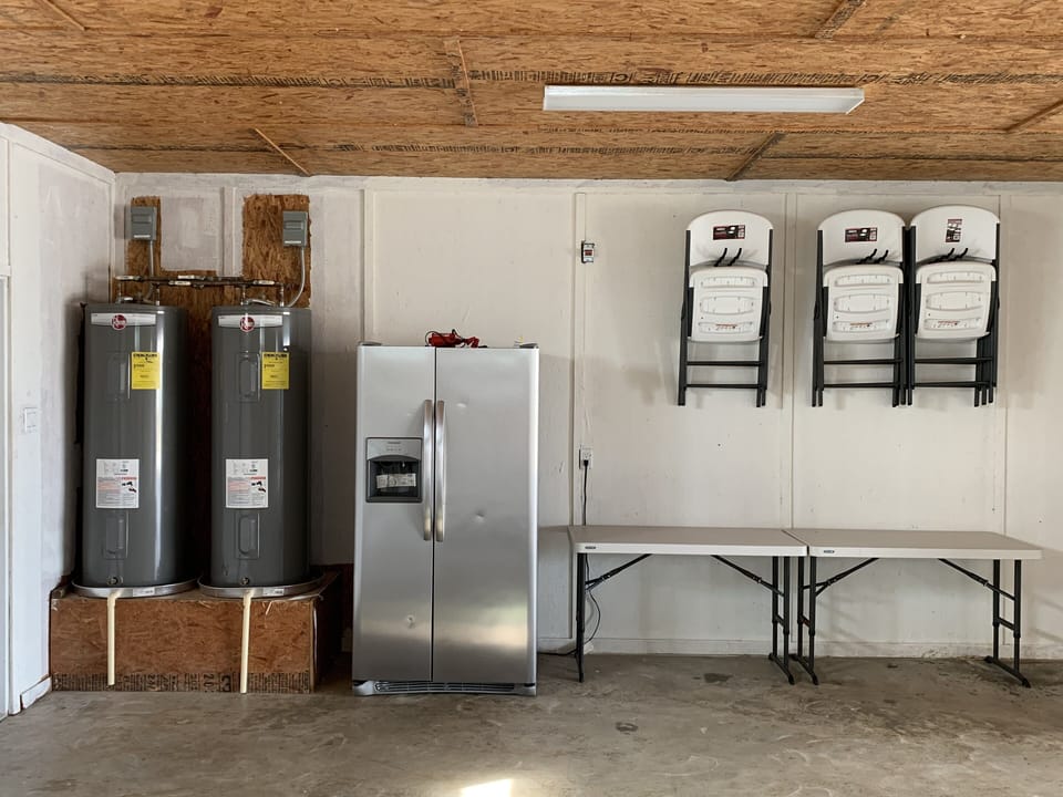 House comes with two water heaters and two refrigerators for your convenience. 