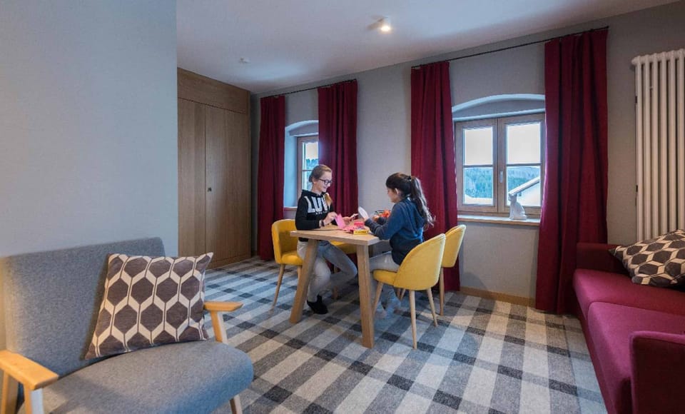 Double Room | Living area | 30-inch flat-screen TV with cable channels, TV