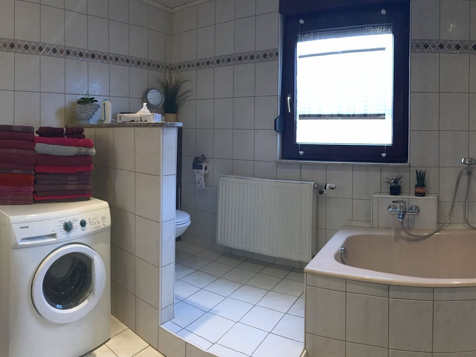 Apartment | Bathroom | Separate tub and shower, hair dryer, towels