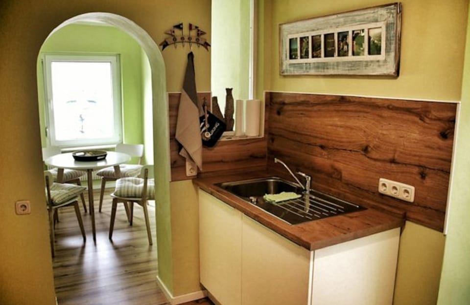 Apartment, 1 Bedroom, Balcony | Private kitchen | Fridge, stovetop, electric kettle, toaster