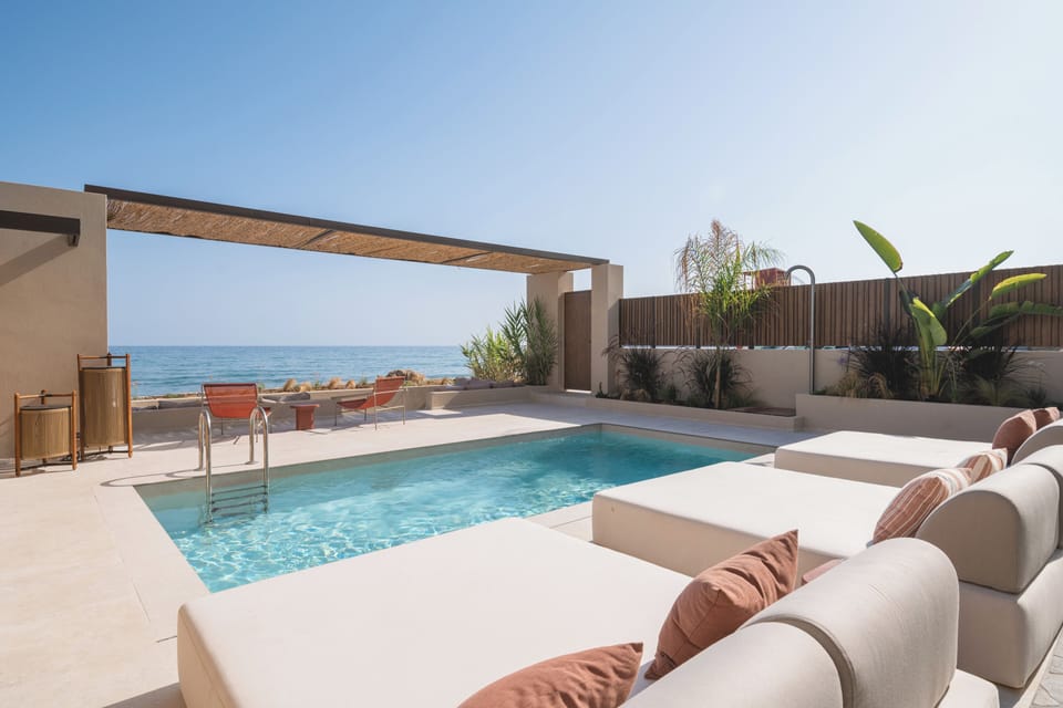 Swim moments from the beach in Espera’s elegant private pool.