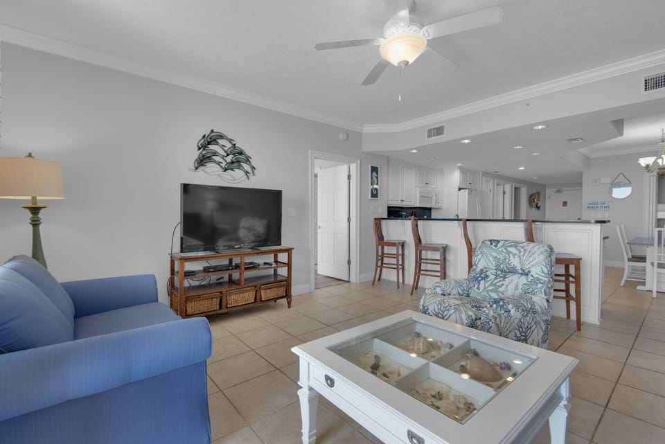 Condo, Multiple Beds, Pool Access | Living area | 32-inch TV with cable channels