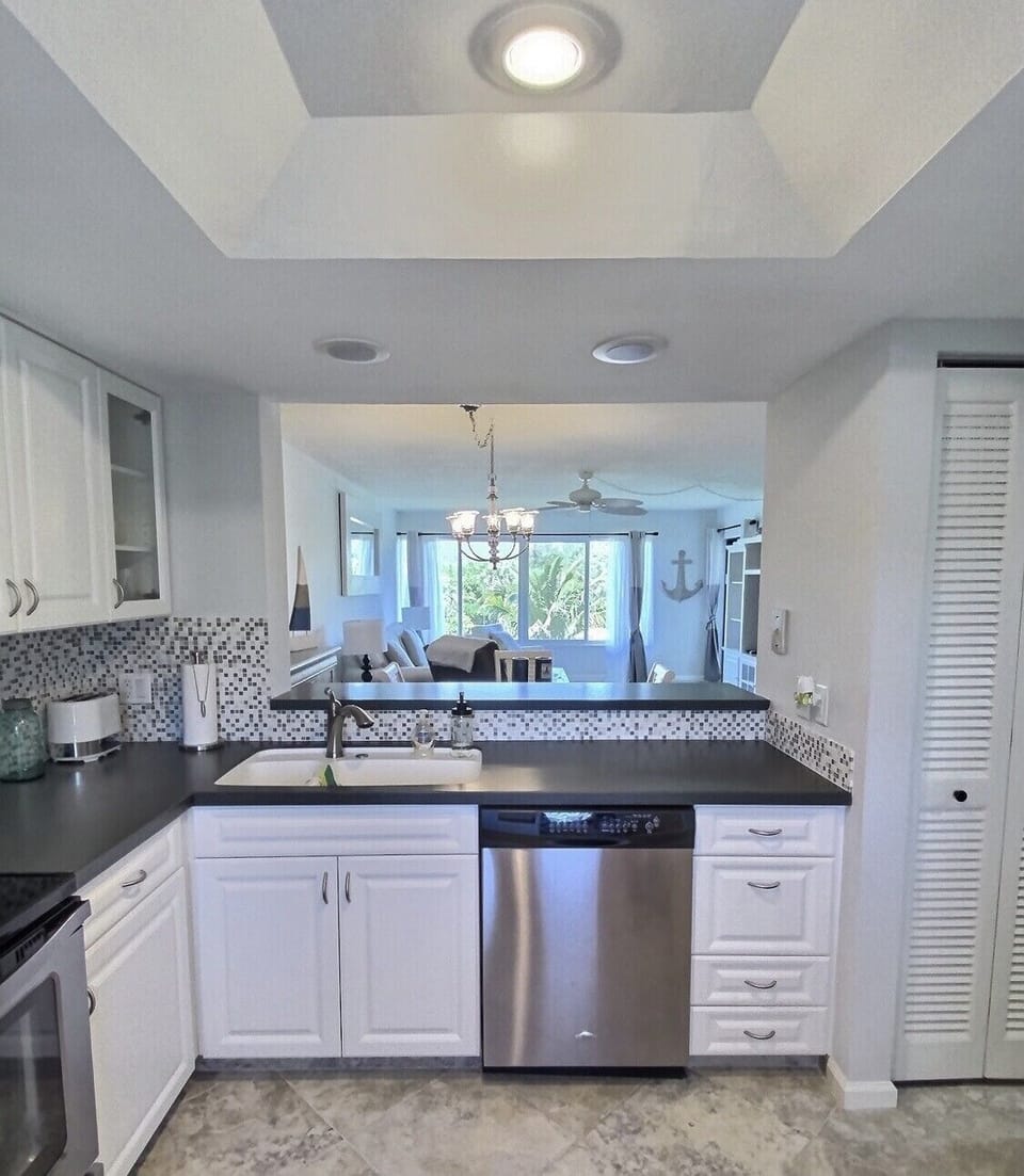 Kitchen, looking out to main living area 