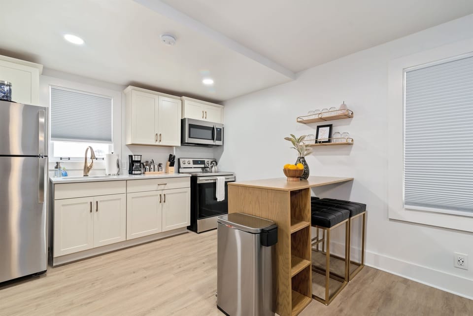 The kitchen is well-equipped with cooking and baking necessities