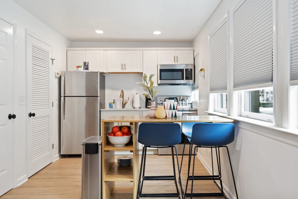 The kitchen is well-equipped with cooking and baking necessities