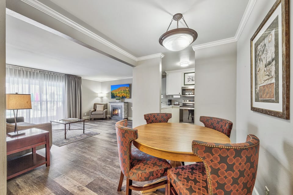 Deluxe Suite, 1 Bedroom, Poolside | Living area | 60-inch flat-screen TV with cable channels, TV