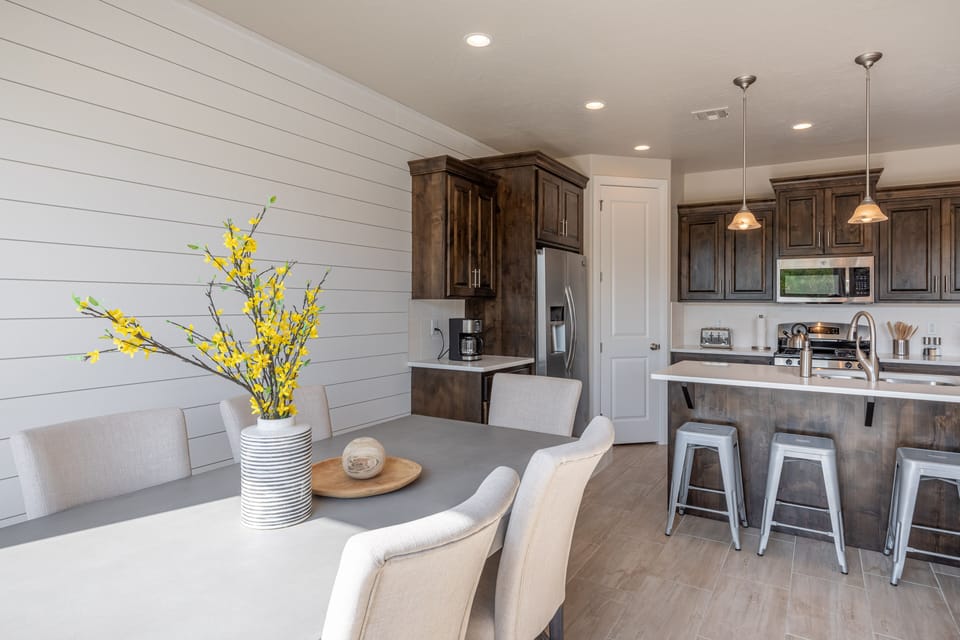 Dining Room View - With an open and spacious floor plan, the Dining Room and Kitchen can accommodate meal preparations for groups large or small.