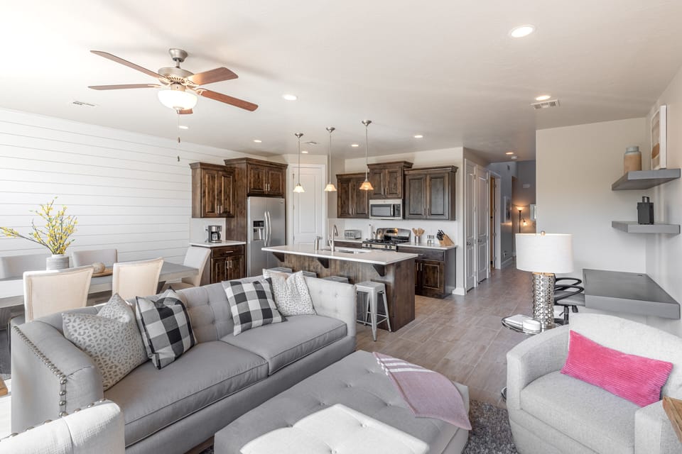 Living Room Area - The Living Room is conveniently located adjacent to the Kitchen and Dining Table and is a great place for entertaining guests during downtime.