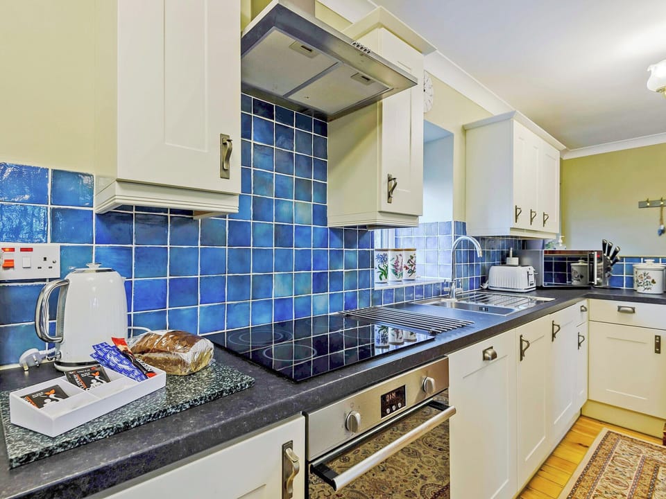Kitchen | Bwthyn - Rhyddallt Ganol Cottages, Caethro, near Caernarfon