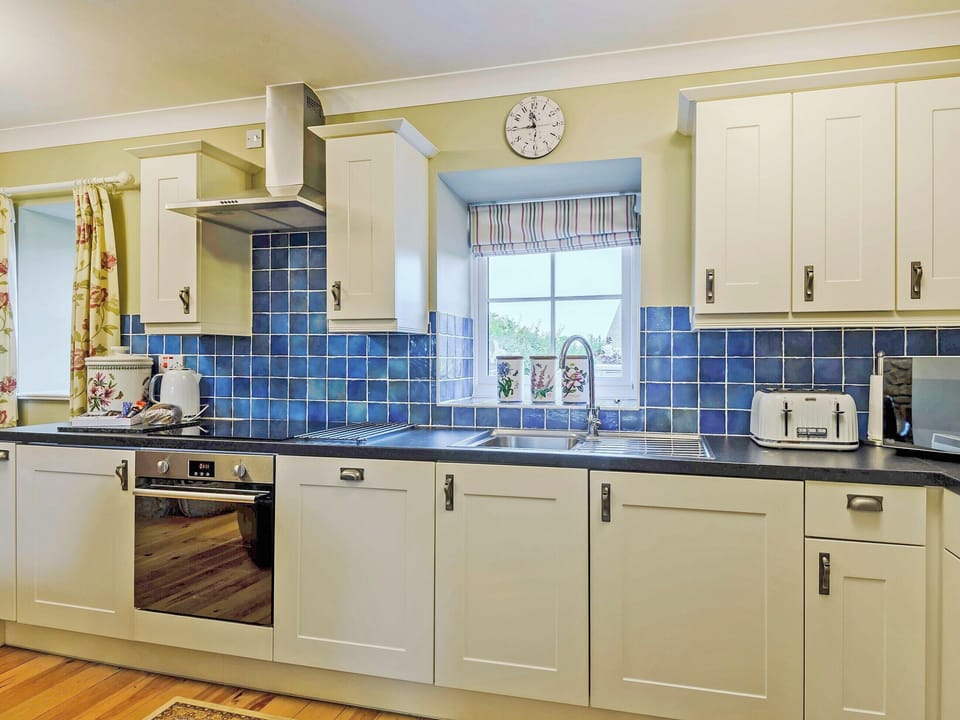 Kitchen | Bwthyn - Rhyddallt Ganol Cottages, Caethro, near Caernarfon