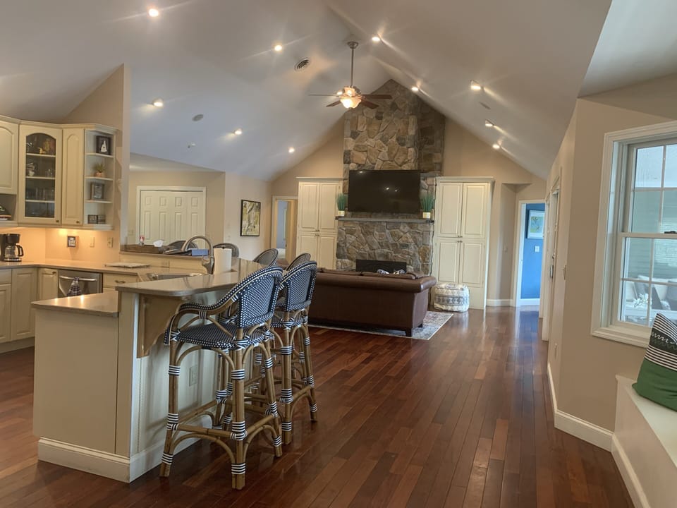 There is comfortable bar seating open to the Living Room
