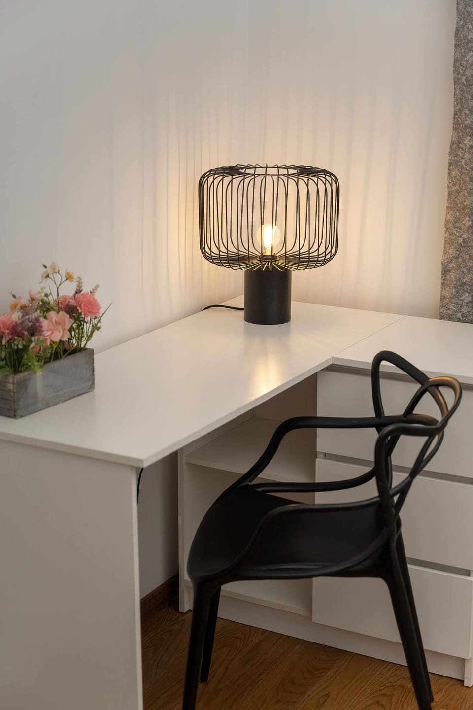 A functional desk with a chair, ideal for work or study, blending seamlessly with the room's design.