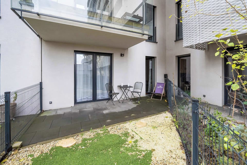  A landscaped area with well-maintained gardens, offering a serene space for residents.
