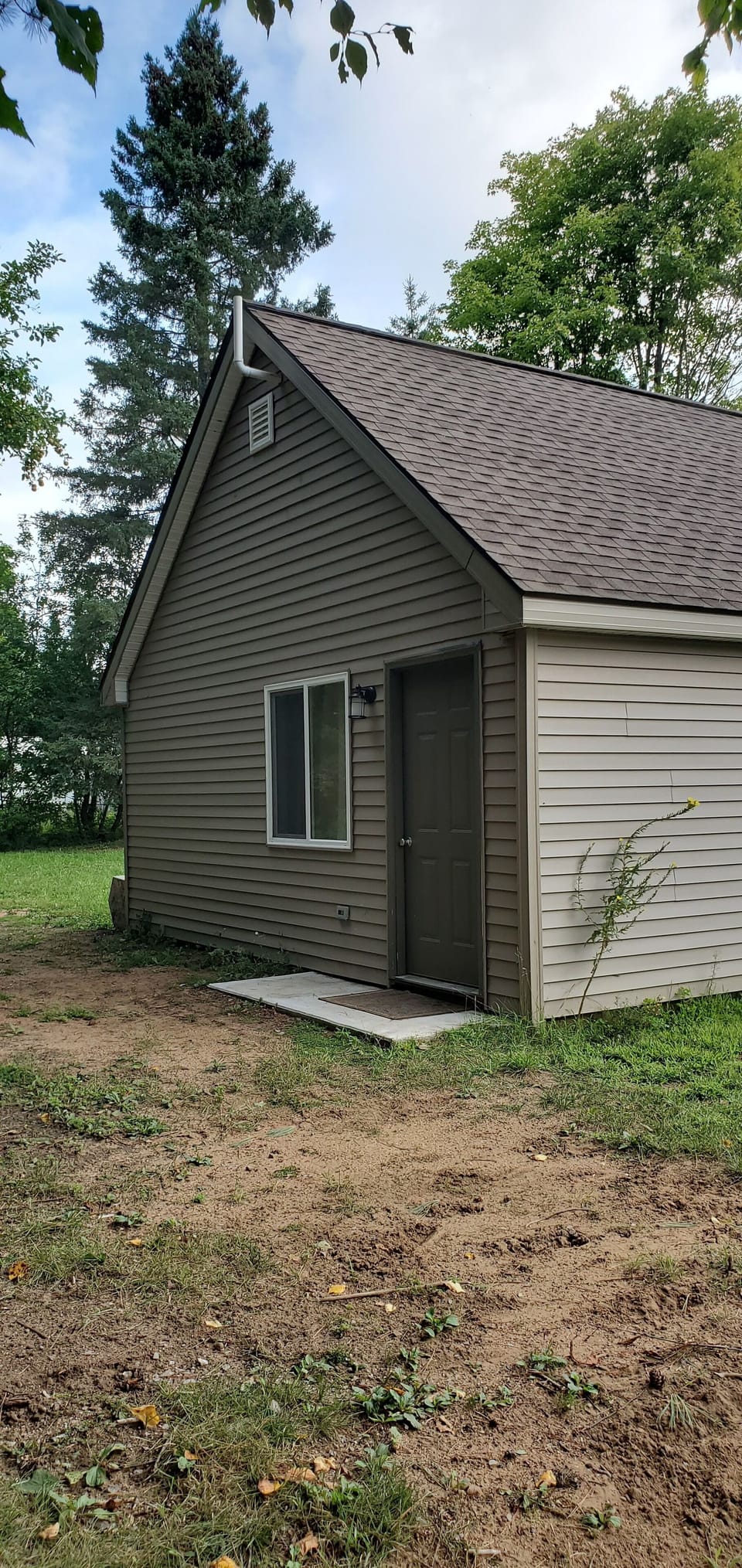 Cabin entrance is located on the north side of the building.