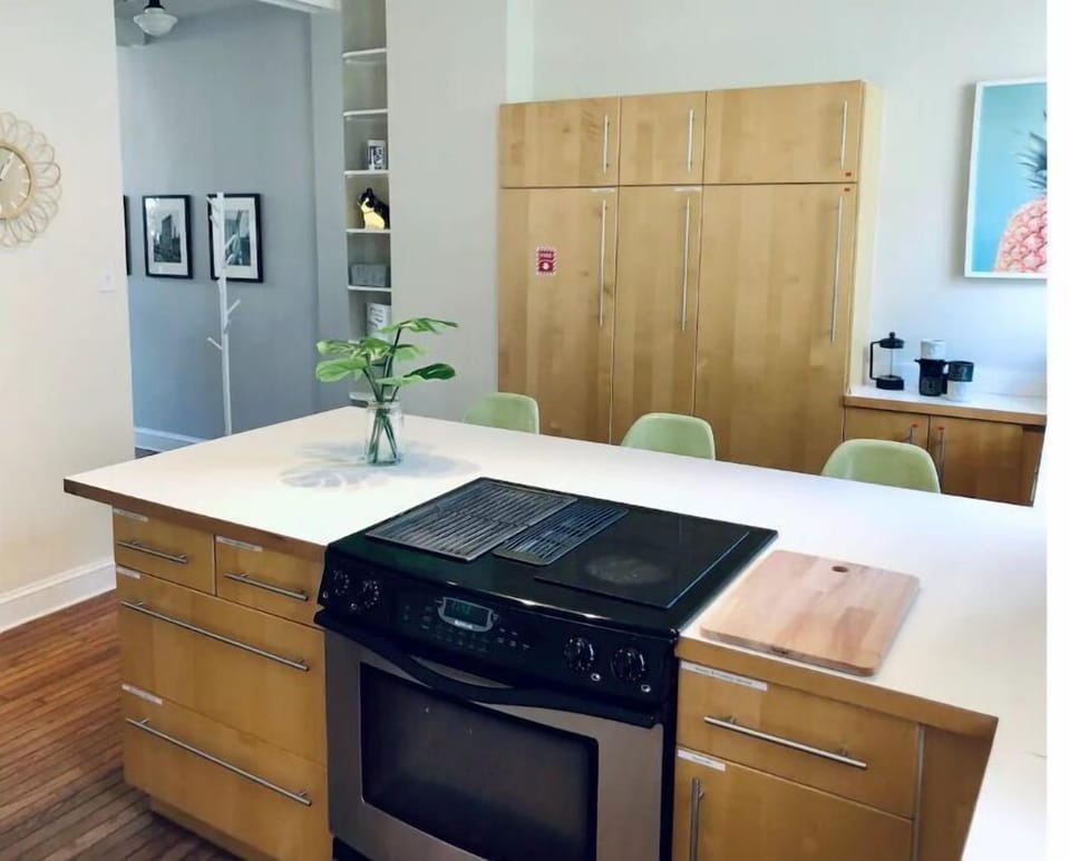 Stainless steel appliances w/Jenn-Air induction cook-top and electric oven. 