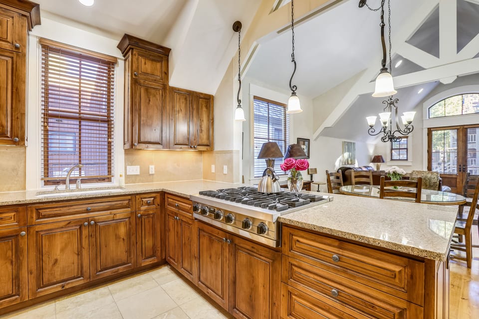 Kitchen overlooking dining and living areas.