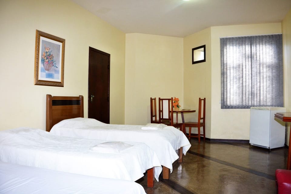 Deluxe Room | Minibar, desk, laptop workspace, iron/ironing board
