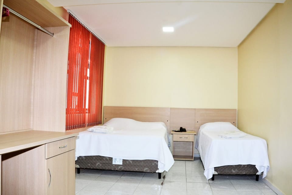 Deluxe Room | Minibar, desk, laptop workspace, iron/ironing board