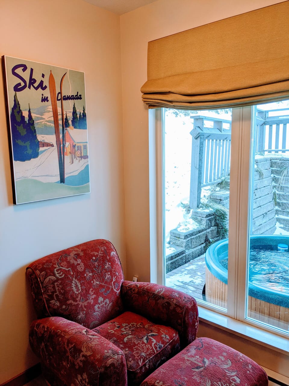 Cozy reading nook by back door overlooking deck. 