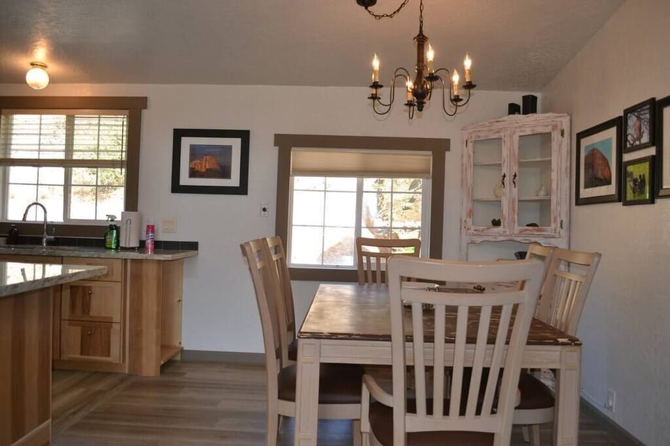 The dining area has views of the natural setting in the back yard. 