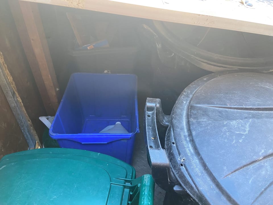 Garbage, Recycling & Compost bin in containment