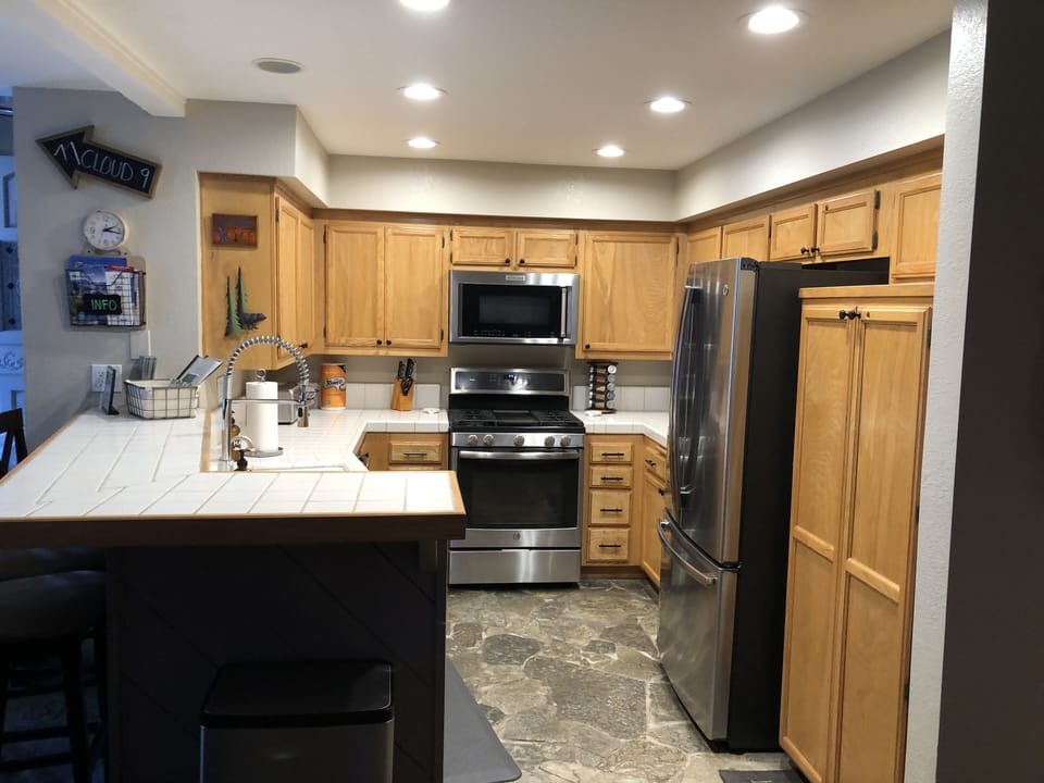 Fully stocked kitchen with high-end appliances