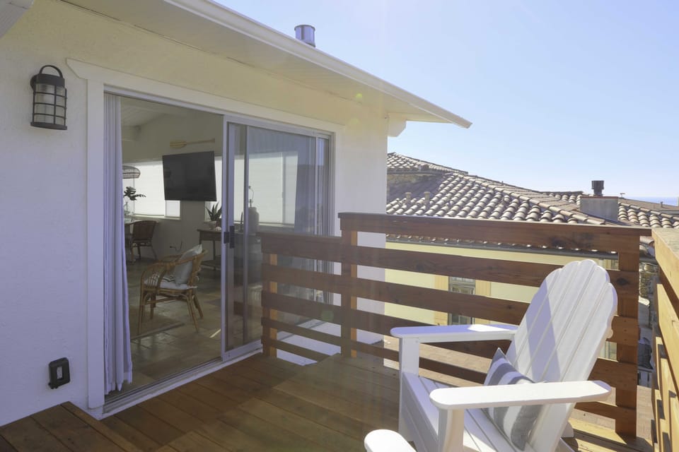 The patio is  is accessible from large sliding glass doors from the living room and bedroom.