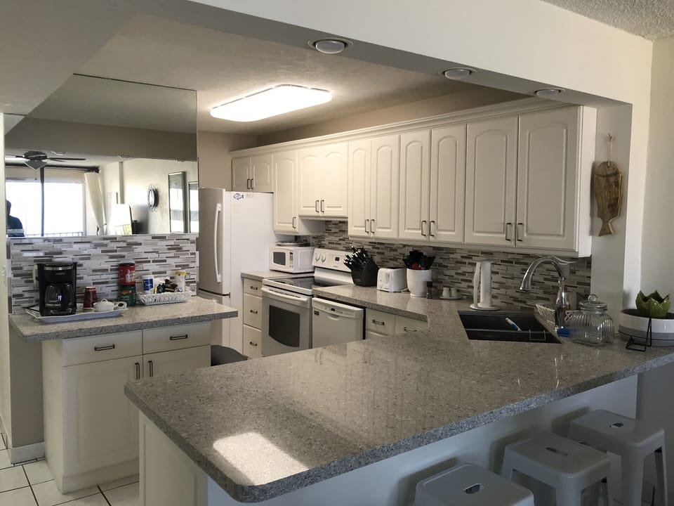 Open kitchen with full water view 