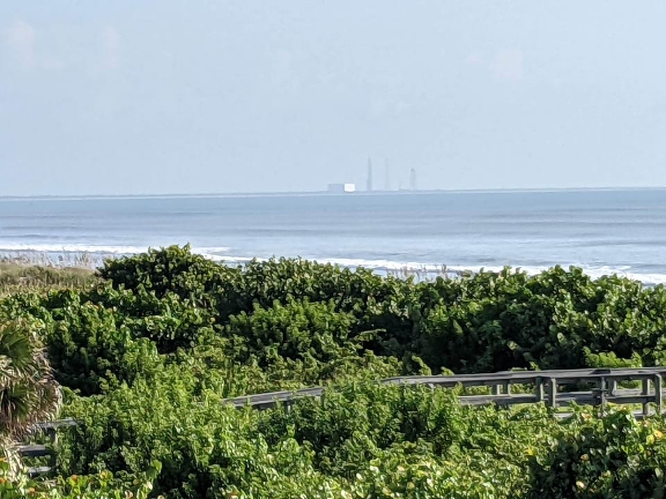 You can see Cape Canaveral launches from the beach