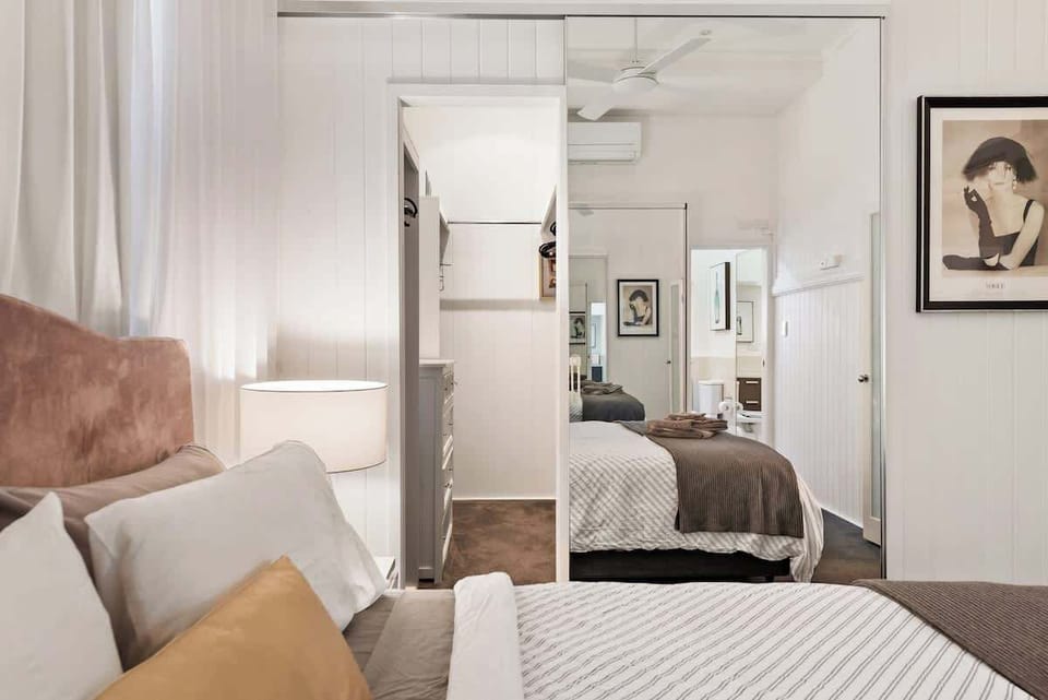 Clever use of space with a hidden walk in dressing room