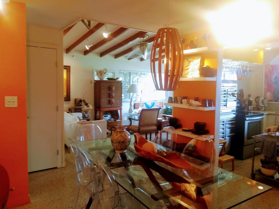 Dining area opens to living and kitchen.