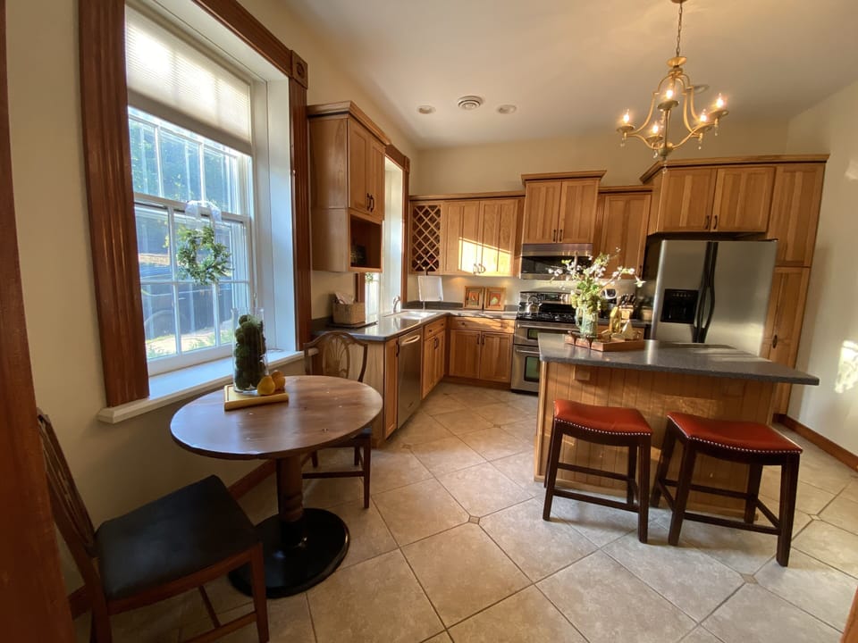 The  fully equipped kitchen with seating for four and walk in pantry…