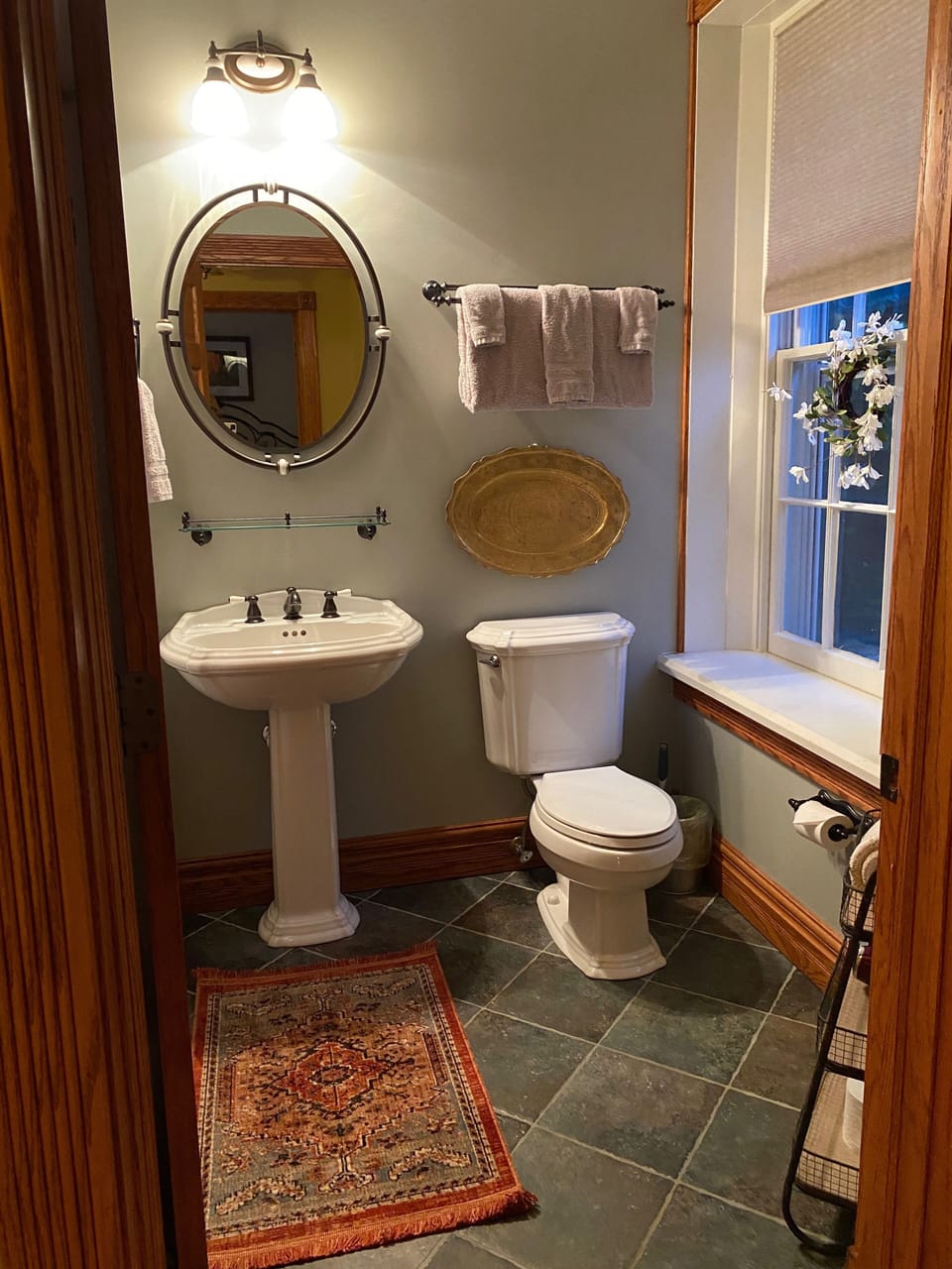 A full bath with shower and tub for guest bedrooms one and two…