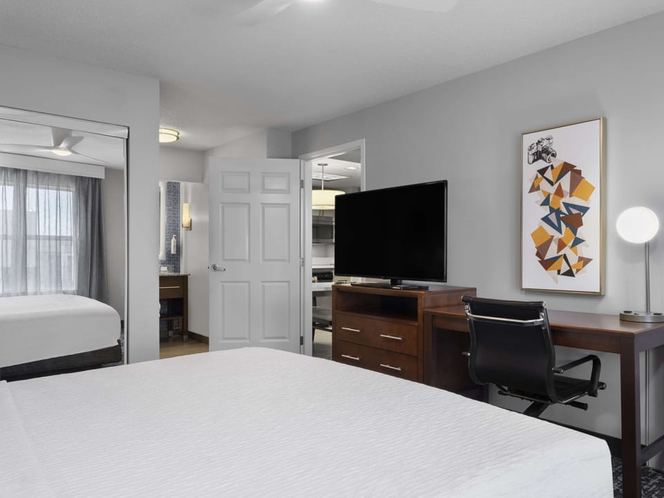 Down comforters, pillowtop beds, in-room safe, desk