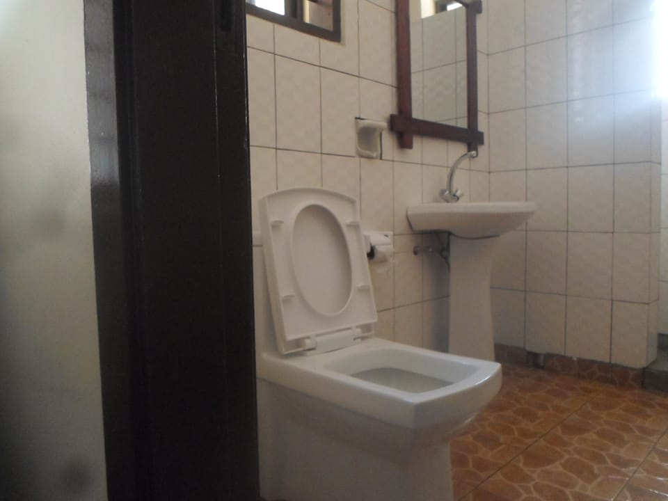 Family Triple Room | Bathroom | Shower, slippers, towels