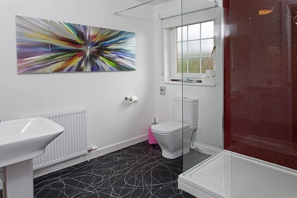 large ground floor shower room and toilet with wheelchair accessible