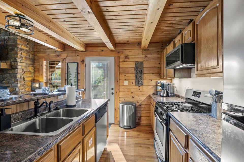 Well stocked kitchen with everything you need to cook, bake, toast and brew.