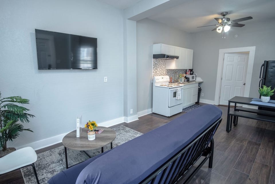 Apartment (1 Bedroom) | Living area | 50-inch TV with satellite channels