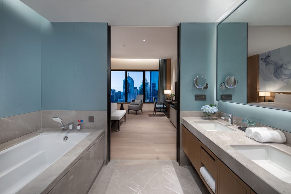 President Suite | Bathroom | Shower, free toiletries, hair dryer, slippers