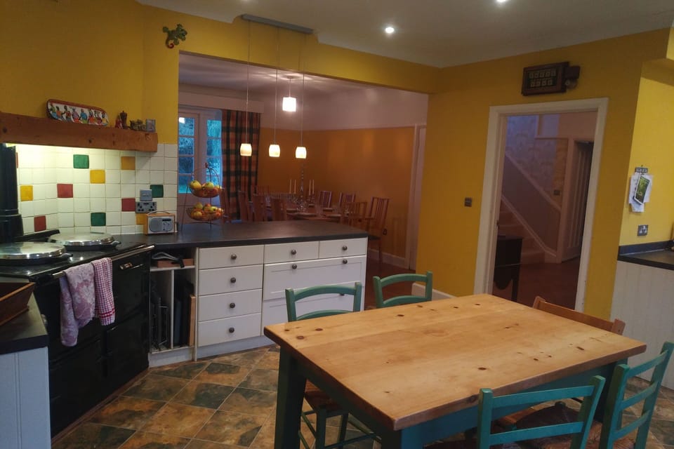 Kitchen table, peninsula, view towards dining area.