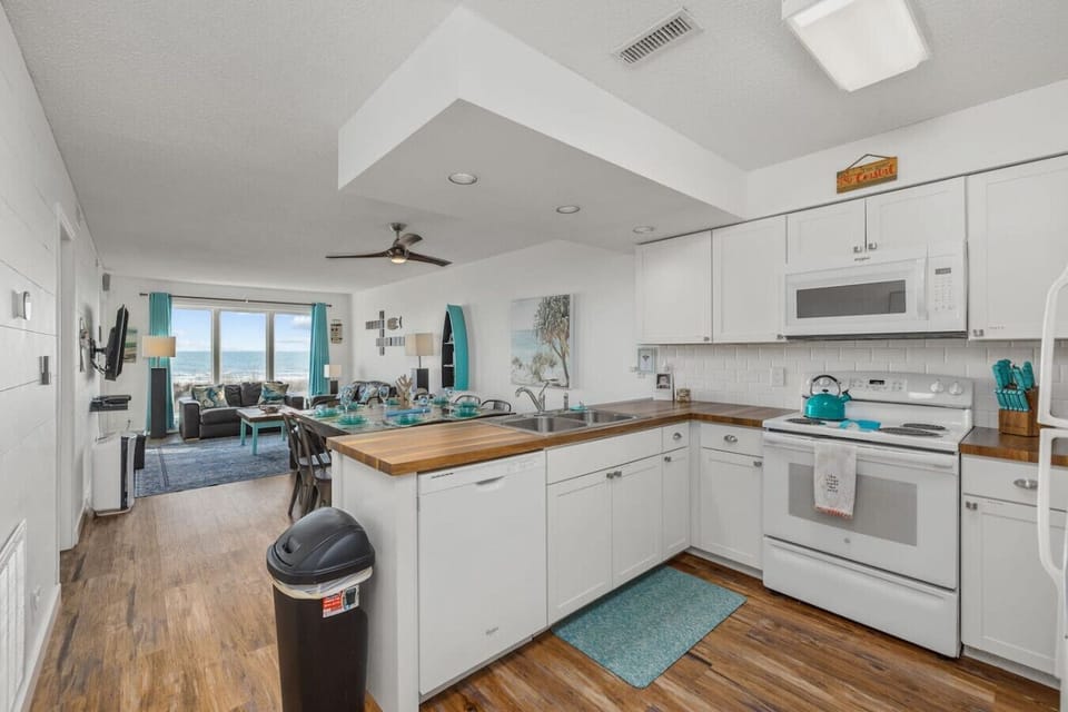 The open concept living area allows everyone to gather for meals, movies, and board games.