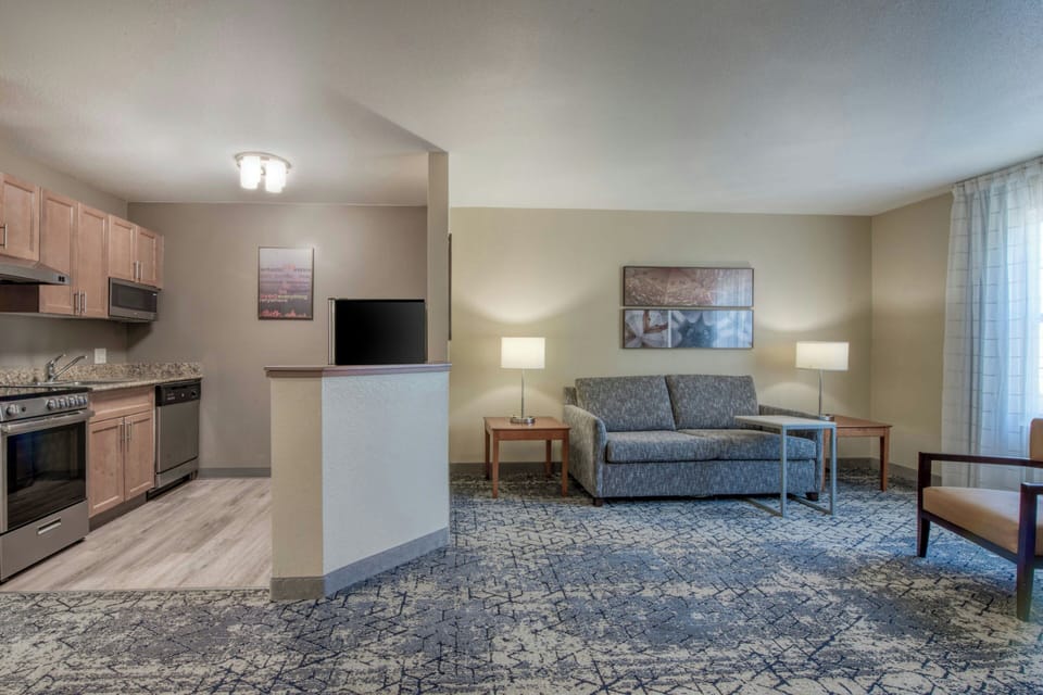 Suite, 2 Bedrooms | Living area | TV