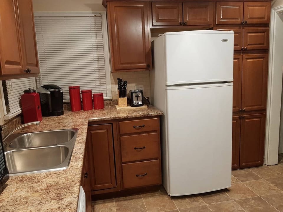 Updated cabinetry with plenty of storage and FULL sized appliances.