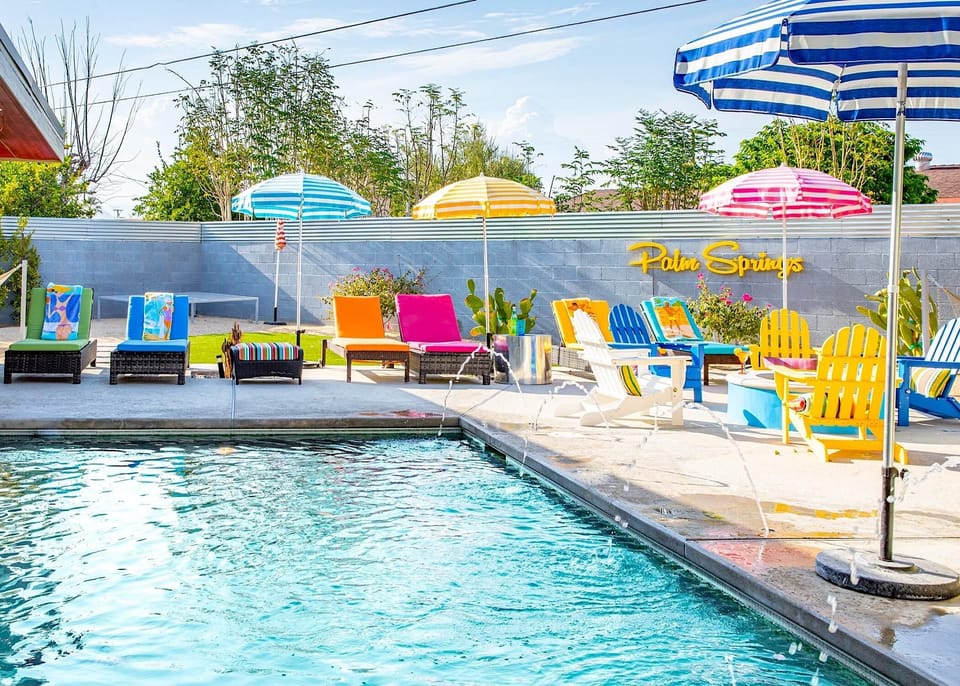 Water fountains built into the pool deck